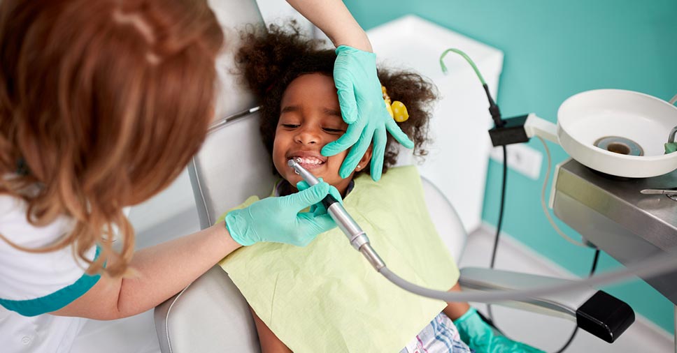 Criança no dentista
